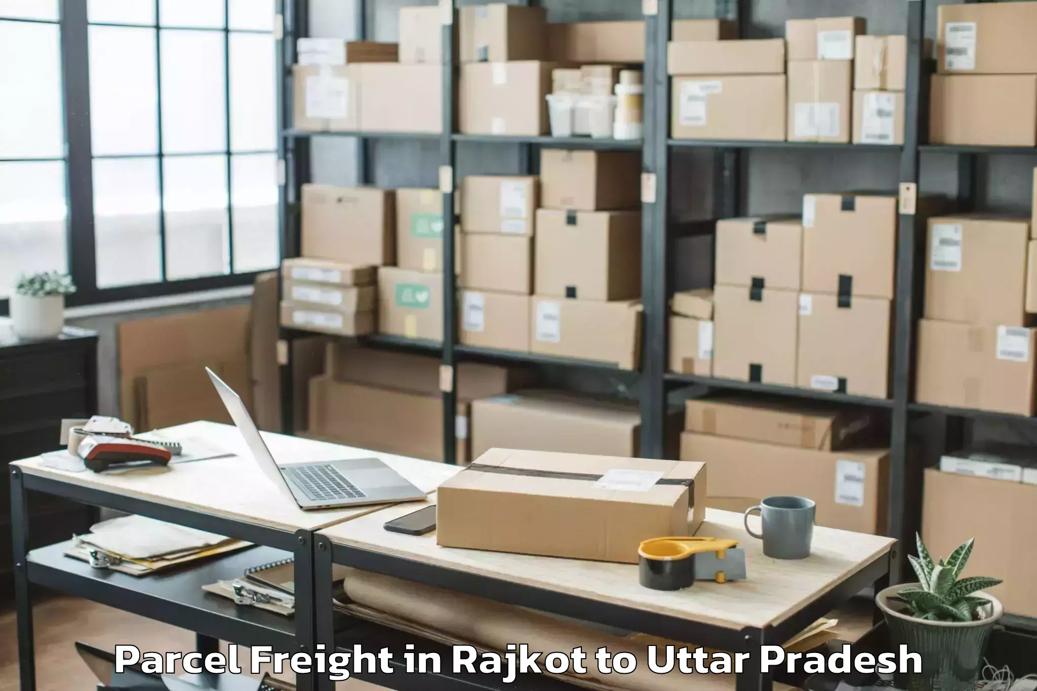 Book Your Rajkot to Maudaha Parcel Freight Today